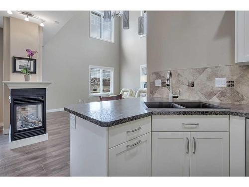 2 Garrison Place, Red Deer, AB - Indoor Photo Showing Kitchen With Double Sink