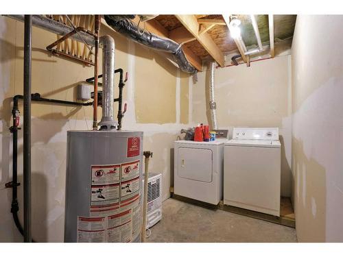 4542 44 Avenue Close, Rocky Mountain House, AB - Indoor Photo Showing Laundry Room