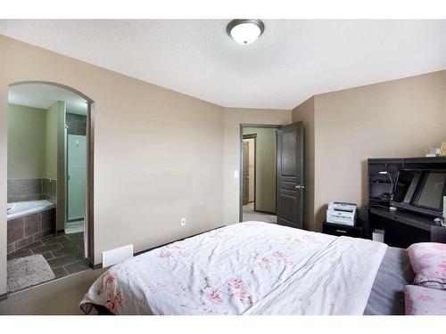 1068 Sherwood Boulevard Nw, Calgary, AB - Indoor Photo Showing Bedroom