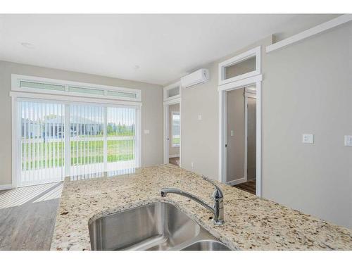 36-6519 46 Street, Wetaskiwin, AB - Indoor Photo Showing Kitchen With Double Sink