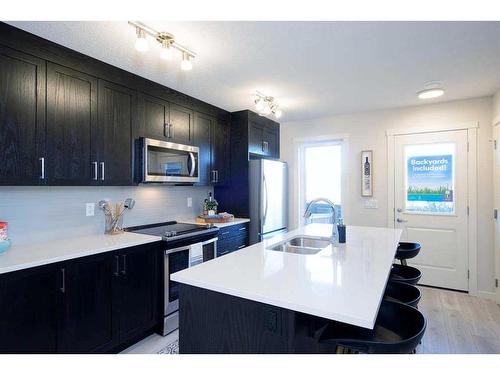 14645 1 Street Ne, Calgary, AB - Indoor Photo Showing Kitchen With Double Sink With Upgraded Kitchen