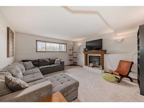 5909 61 Avenue, Ponoka, AB - Indoor Photo Showing Living Room With Fireplace