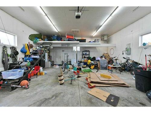 182 Sabre Road, Springbrook, AB - Indoor Photo Showing Garage