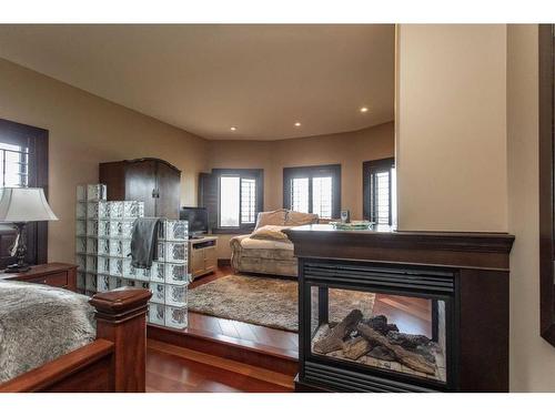 132-38254 Range Road 265, Rural Red Deer County, AB - Indoor Photo Showing Living Room With Fireplace