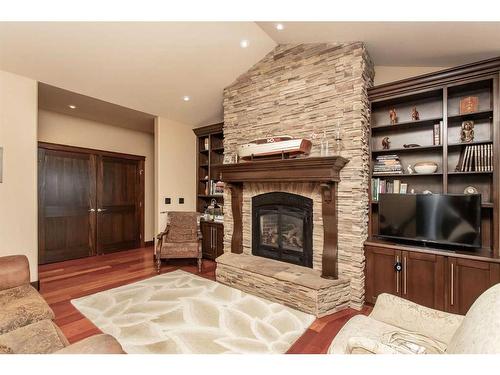 132-38254 Range Road 265, Rural Red Deer County, AB - Indoor Photo Showing Living Room With Fireplace