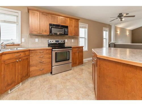 124 Vickers Close, Red Deer, AB - Indoor Photo Showing Kitchen With Double Sink