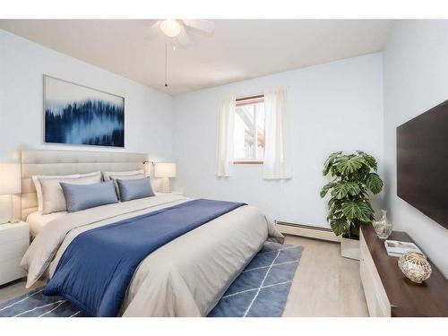 24-4240 46A Avenue Crescent, Red Deer, AB - Indoor Photo Showing Bedroom