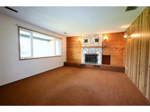 43231 Range Road 220, Rural Camrose County, AB - Indoor Photo Showing Living Room With Fireplace