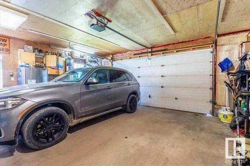 4703 52 Avenue, Warburg, AB - Indoor Photo Showing Garage