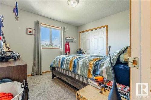 4703 52 Avenue, Warburg, AB - Indoor Photo Showing Bedroom