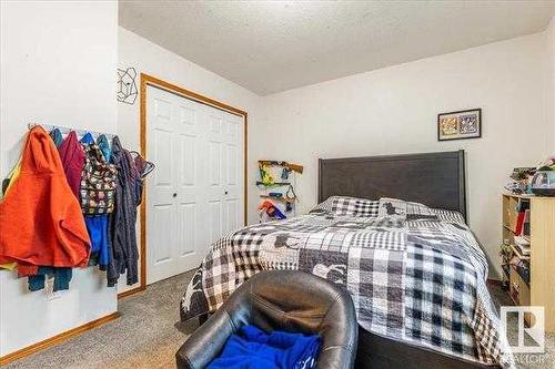 4703 52 Avenue, Warburg, AB - Indoor Photo Showing Bedroom