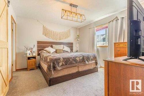 4703 52 Avenue, Warburg, AB - Indoor Photo Showing Bedroom