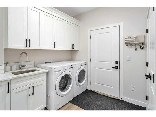 36 Meadow Close, Lacombe, AB - Indoor Photo Showing Laundry Room