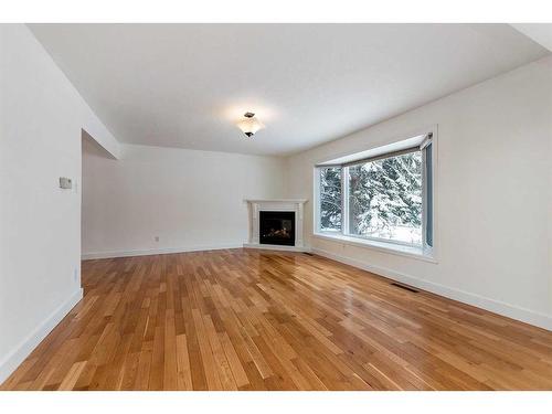 3749 43A Avenue, Red Deer, AB - Indoor Photo Showing Living Room With Fireplace