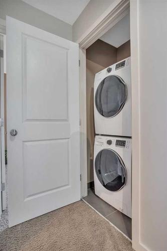 66 Crossley Street, Red Deer, AB - Indoor Photo Showing Laundry Room