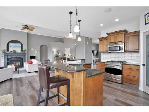 39328 Range Road 15, Rural Lacombe County, AB - Indoor Photo Showing Kitchen With Fireplace