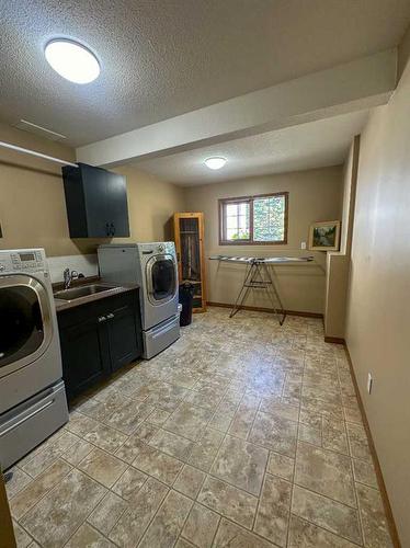 81073 Old Highway 11A, Rural Clearwater County, AB - Indoor Photo Showing Laundry Room