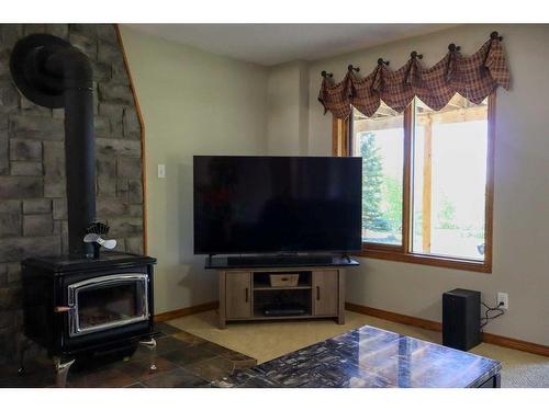 81073 Old Highway 11A, Rural Clearwater County, AB - Indoor Photo Showing Living Room With Fireplace