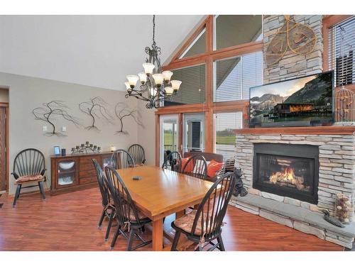 4030-25054 South Pine Lake Road, Rural Red Deer County, AB - Indoor Photo Showing Dining Room With Fireplace