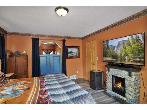 39527 Range Road 3-1, Rural Lacombe County, AB - Indoor Photo Showing Living Room With Fireplace