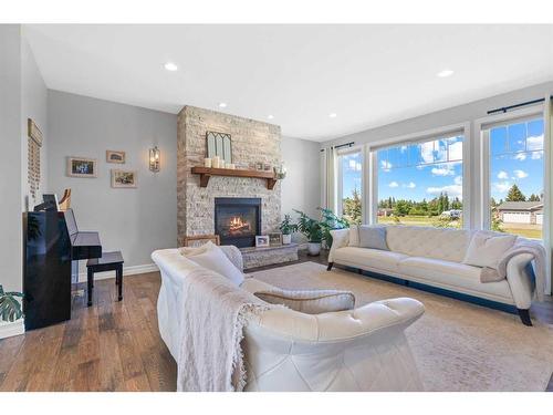 61-Lakeview Estates, Rural Lacombe County, AB - Indoor Photo Showing Living Room With Fireplace