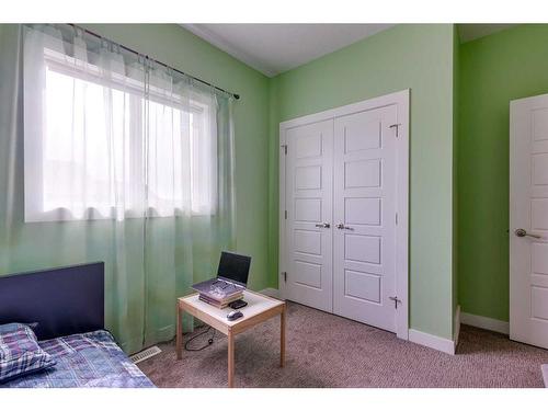 91 Cedar Square, Blackfalds, AB - Indoor Photo Showing Bedroom