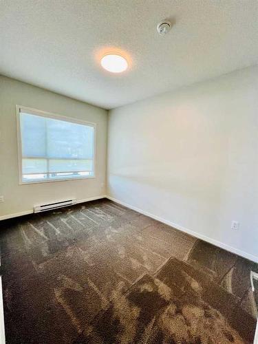 104-40 Carrington Plaza Nw, Calgary, AB - Indoor Photo Showing Other Room