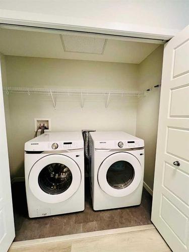 104-40 Carrington Plaza Nw, Calgary, AB - Indoor Photo Showing Laundry Room