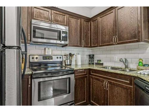 241-901 Mountain Street, Canmore, AB - Indoor Photo Showing Kitchen With Double Sink