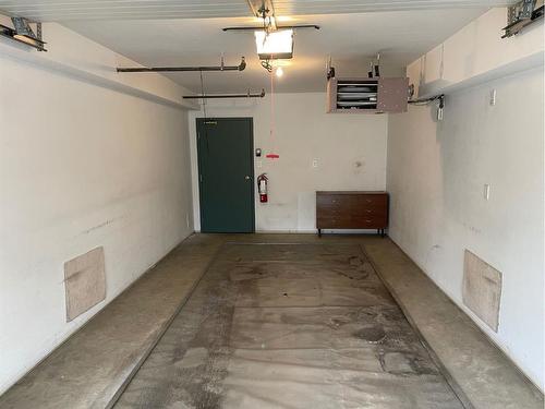 206-4625 50 Street, Camrose, AB - Indoor Photo Showing Garage