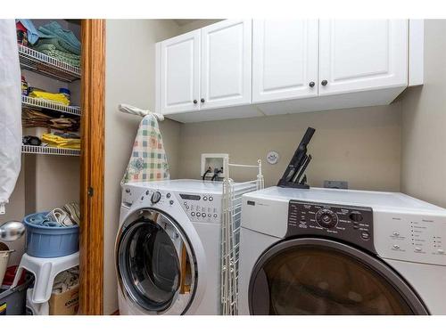 120-37411 Waskasoo Avenue, Rural Red Deer County, AB - Indoor Photo Showing Laundry Room