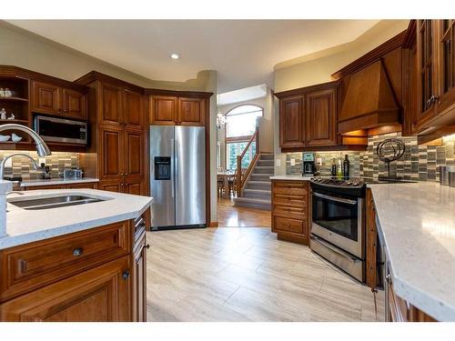 120-37411 Waskasoo Avenue, Rural Red Deer County, AB - Indoor Photo Showing Kitchen With Double Sink