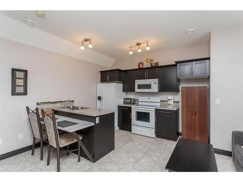 10 Iron Wolf Close, Lacombe, AB - Indoor Photo Showing Kitchen