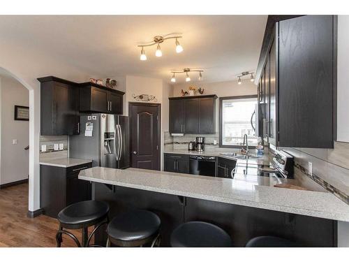 10 Iron Wolf Close, Lacombe, AB - Indoor Photo Showing Kitchen With Stainless Steel Kitchen With Upgraded Kitchen