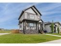 54 Aurora Heights Boulevard, Blackfalds, AB  - Outdoor With Deck Patio Veranda With Facade 