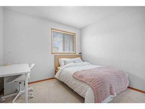 58 Old Boomer Road, Sylvan Lake, AB - Indoor Photo Showing Bedroom