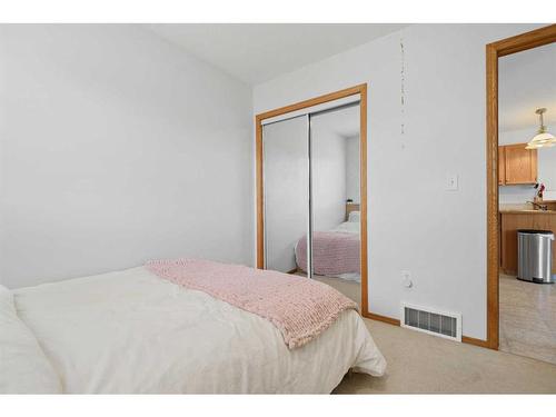 58 Old Boomer Road, Sylvan Lake, AB - Indoor Photo Showing Bedroom