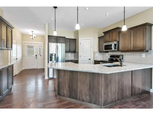 83 Cedar Square, Blackfalds, AB - Indoor Photo Showing Kitchen With Upgraded Kitchen