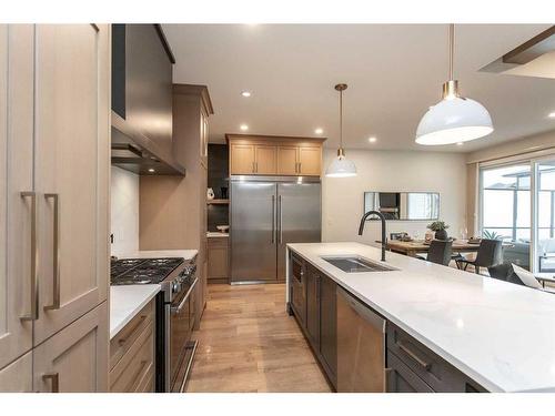 34 Longmire Close, Red Deer, AB - Indoor Photo Showing Kitchen With Stainless Steel Kitchen With Upgraded Kitchen