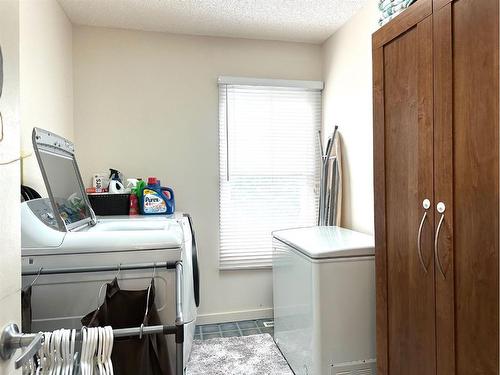 302 1 Avenue East, Alliance, AB - Indoor Photo Showing Laundry Room