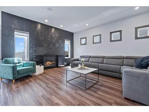 5 Larratt Close, Red Deer, AB - Indoor Photo Showing Living Room With Fireplace