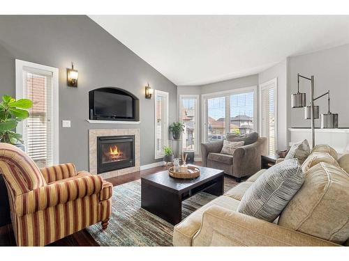 11 Judd Close, Red Deer, AB - Indoor Photo Showing Living Room With Fireplace