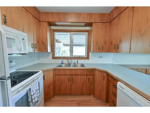 3511 44 Street, Red Deer, AB - Indoor Photo Showing Kitchen With Double Sink