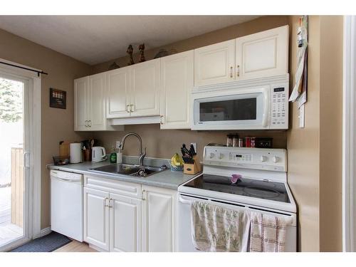 5919 West Park Crescent, Red Deer, AB - Indoor Photo Showing Kitchen With Double Sink