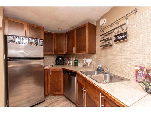 5919 West Park Crescent, Red Deer, AB - Indoor Photo Showing Kitchen With Double Sink