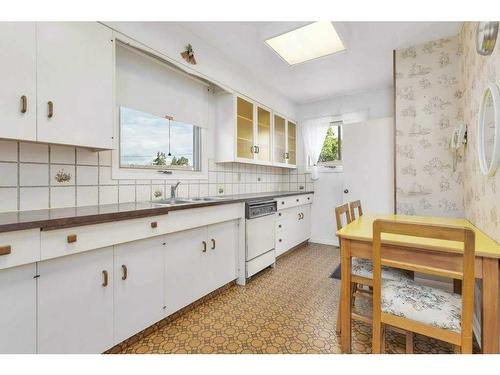 5874 70 Street Drive, Red Deer, AB - Indoor Photo Showing Kitchen With Double Sink