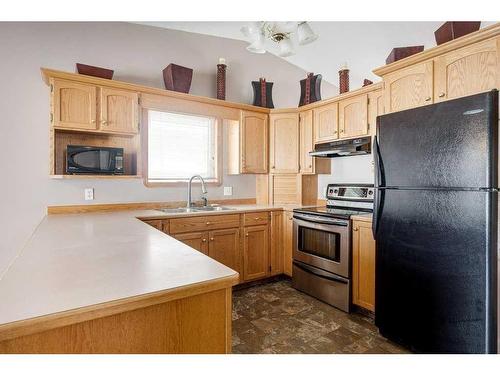 155 Ellenwood Drive, Red Deer, AB - Indoor Photo Showing Kitchen With Double Sink