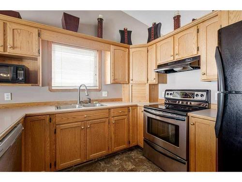 155 Ellenwood Drive, Red Deer, AB - Indoor Photo Showing Kitchen With Double Sink