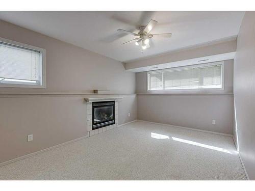 155 Ellenwood Drive, Red Deer, AB - Indoor With Fireplace