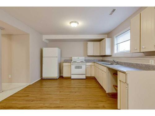 155 Ellenwood Drive, Red Deer, AB - Indoor Photo Showing Kitchen With Double Sink